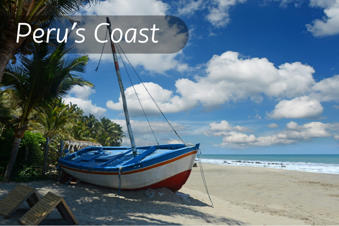 Peru's Coast View of a crystal-clear beach on the Peruvian coast with a boat stranded on the sand